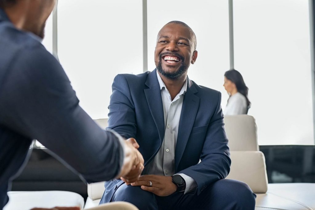 Accountant and client shaking hands