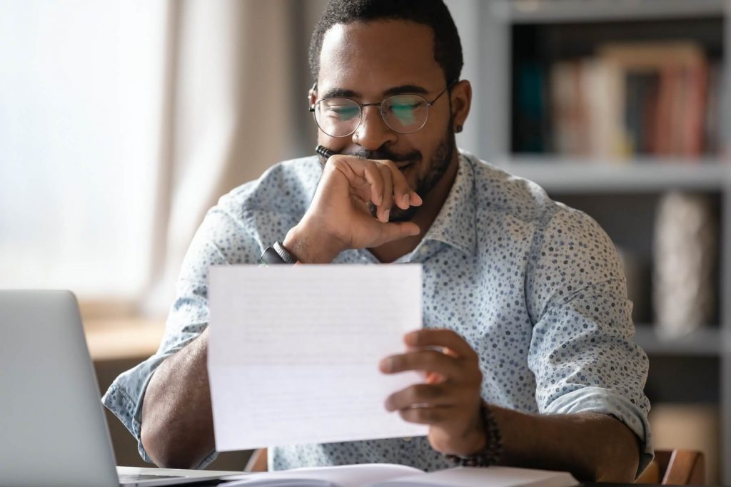 Man overlooking his financial statement